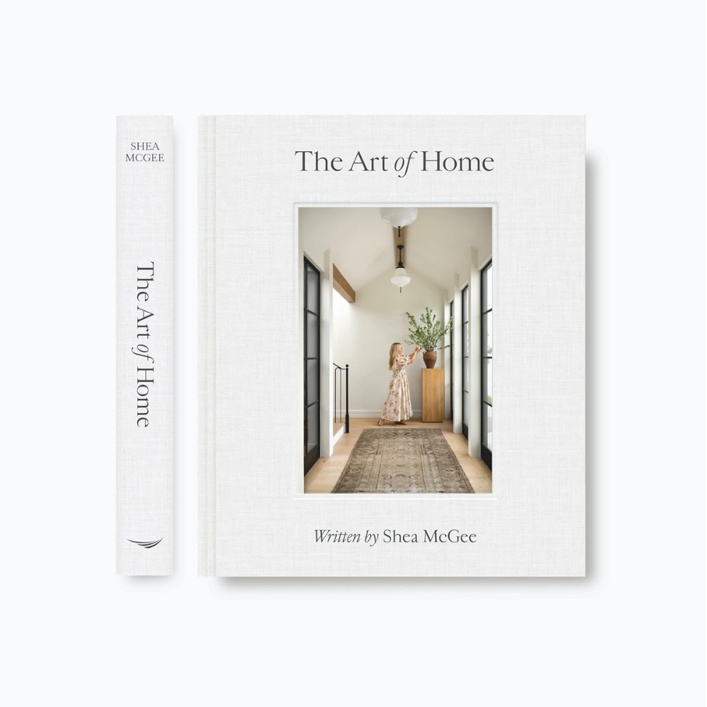 Book titled 'The Art of Home' by Shea McGee on a white background. real estate housewarming gift