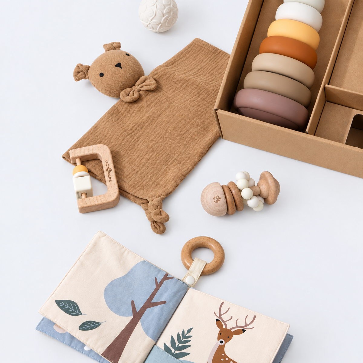 baby gift toys including soft book, bear blanket, wooden rattle and silicone stacker