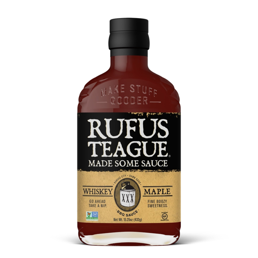 Bottle of Rufus Teague whiskey maple sauce on a white background