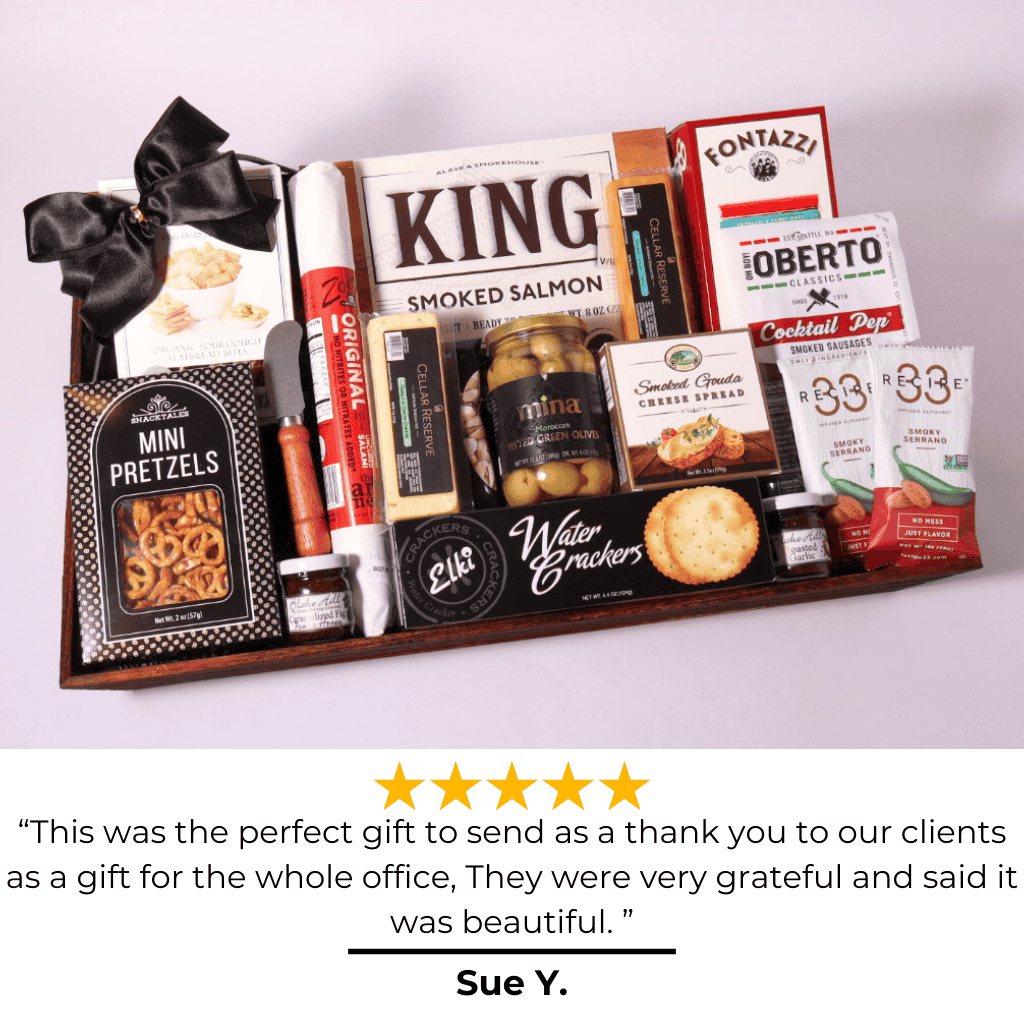 Unique wooden gift tray filled with gourmet charcuterie snacks like smoked Gouda, artisan salami, and dipping pretzels—a unique corporate or client gift showcasing Washington-made products.