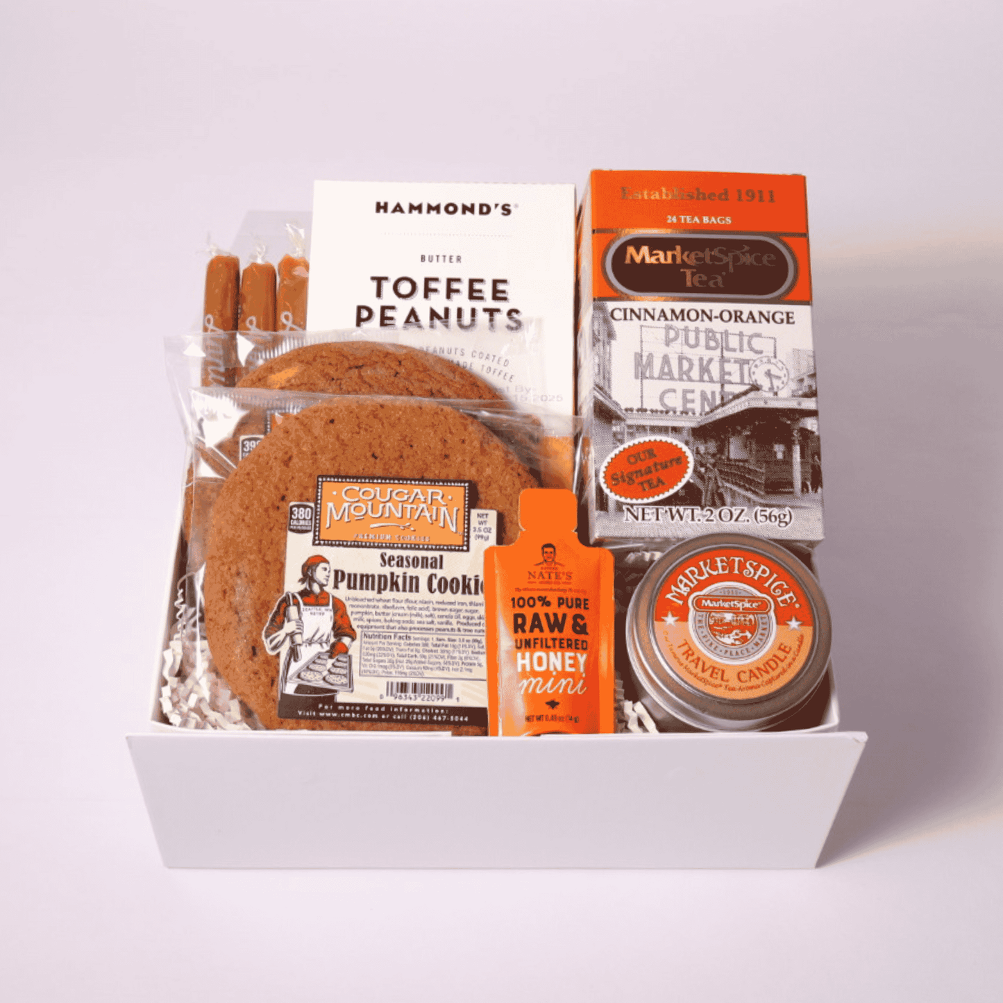 Fall Tea & Treats Gift Box featuring locally made in Washington products, including cinnamon orange spice tea, fresh baked cookies, and a fall spice candle. The perfect seasonal gift for clients, employees, or loved ones.