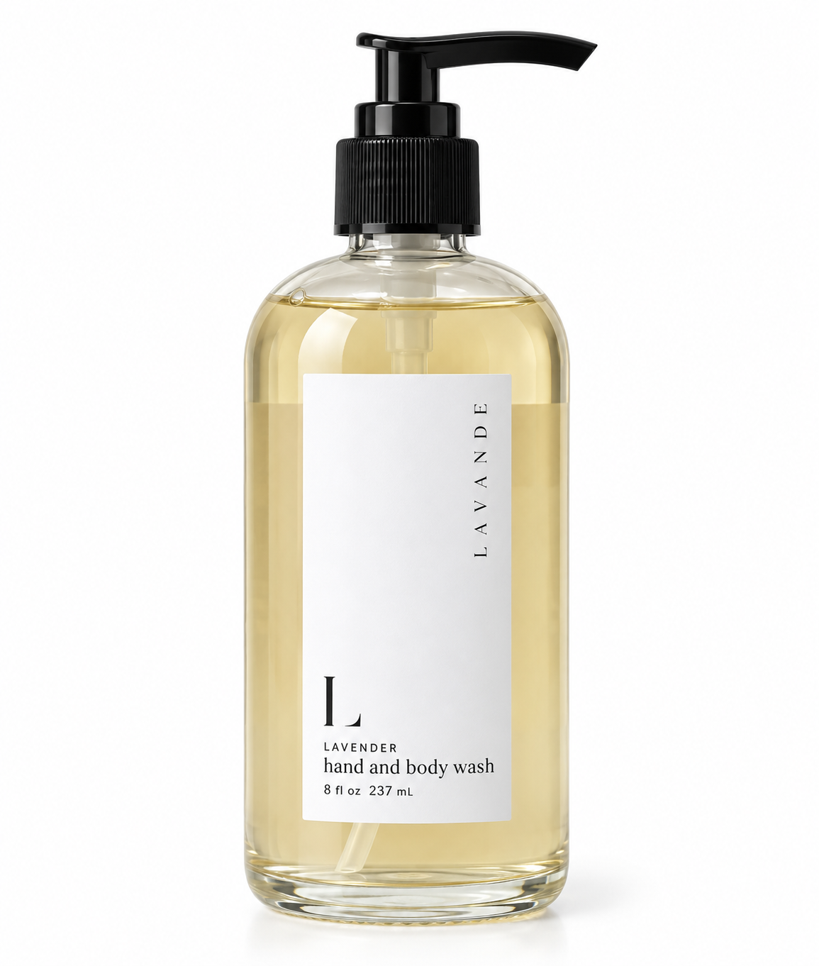A clear plastic pump bottle of lavender hand and body wash with a black pump dispenser and a white label, shown on a clean white background.