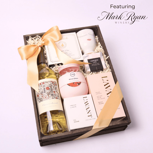 A beautifully arranged pamper her gift box with premium spa essentials, perfect for birthdays, get well soon gifts, or a luxurious self-care treat.  Featuring Mark Ryan pinot gris wine