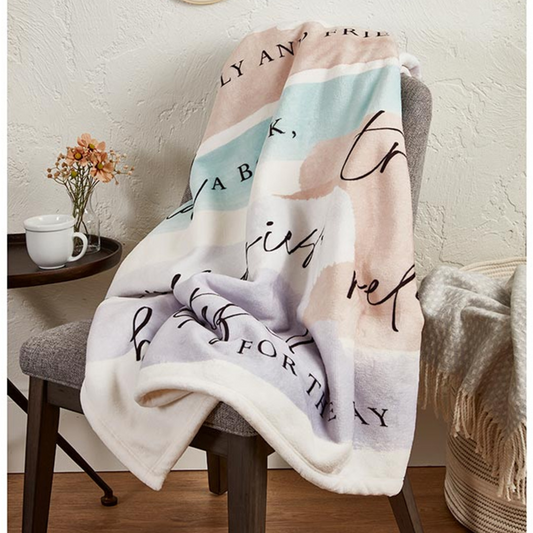 Soft Retirement Rules Throw Blanket draped on a chair with cozy home décor. Perfect retirement gift, inspirational sayings, and PNW gift basket addition.