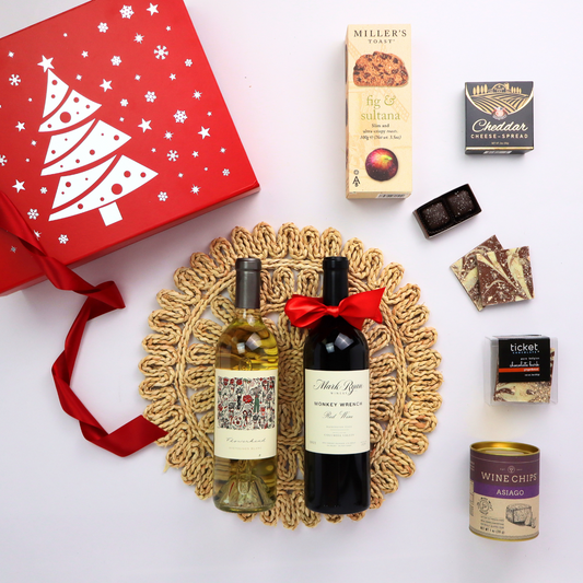Toast of Washington Wine gift box featuring Columbia valley Mark Ryan wine, wine chips, cheese, crackers, and chocolates.