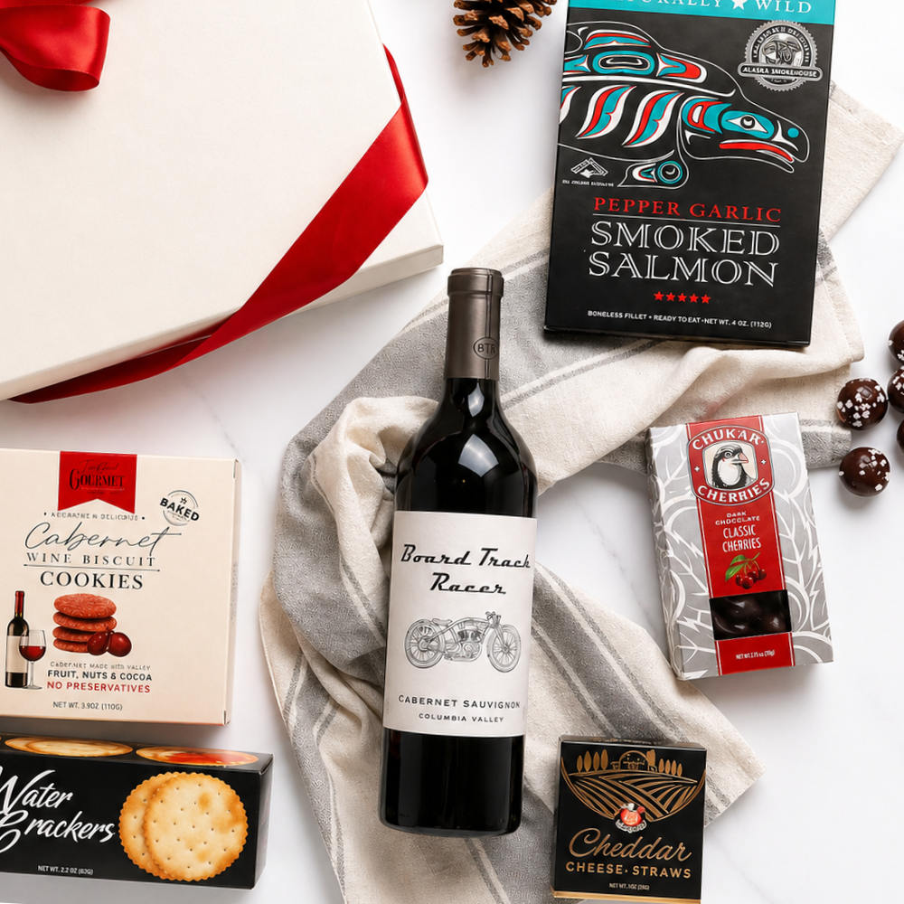 Taste of Washington wine and snack gift box featuring snacks made in the Pacific Northwest. Mark ryan wine, cheese, crackers, chocolate cherries and smoked salmon.