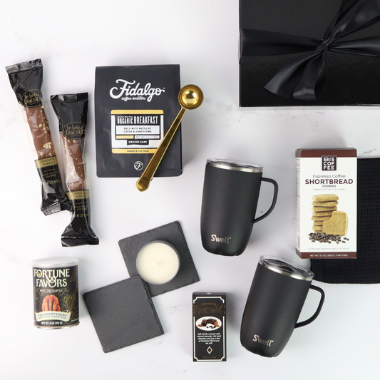 Collection of Seattle coffee-themed gift box items including mugs, coffee packets, and a gift box on a white background.