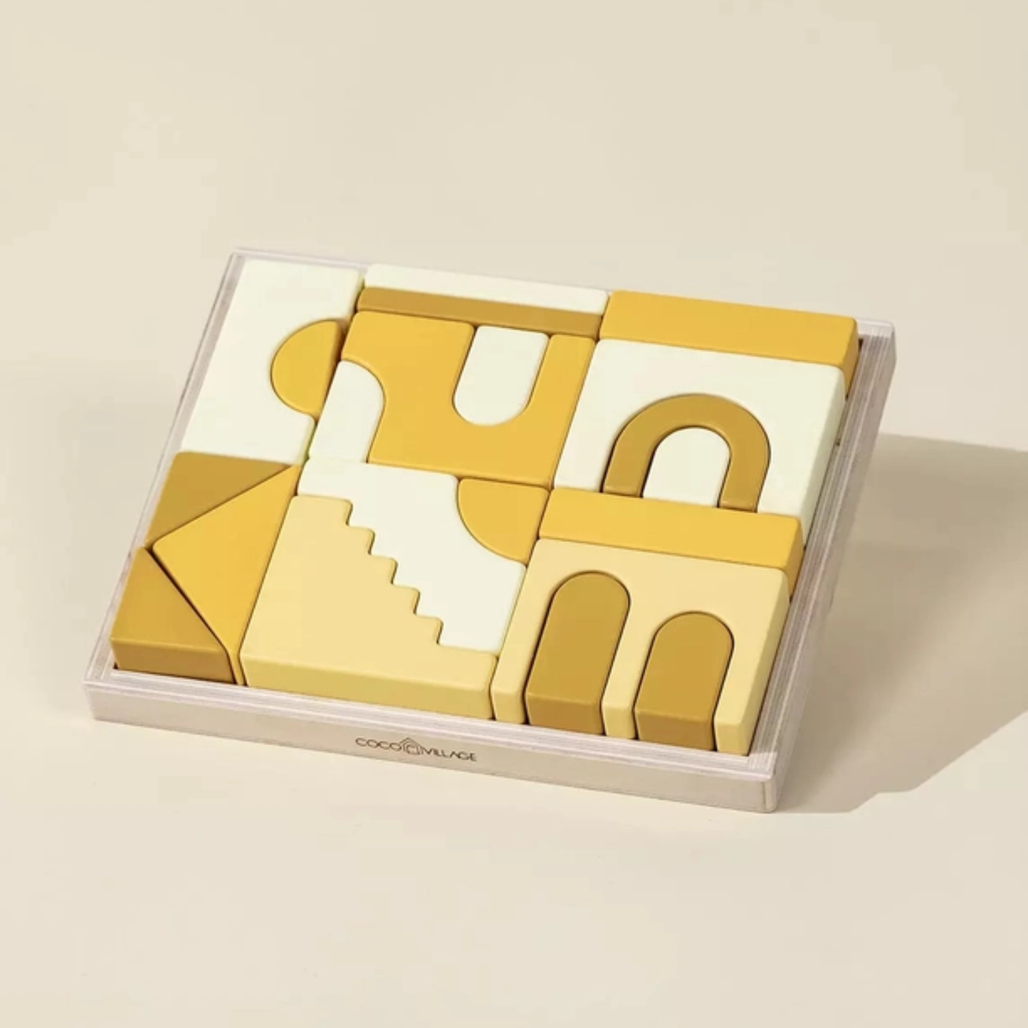 baby blocks gift Set of geometric wooden blocks in a clear box on a beige background