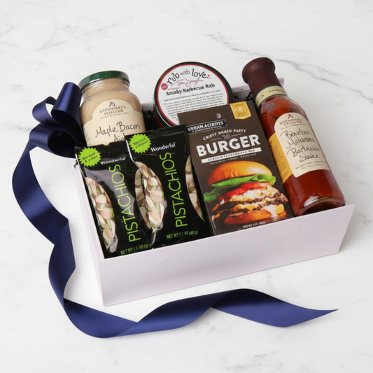 Summer BBQ gift box filled with gourmet sauces, snacks, and Tom Douglas Rub with Love seasoning made in Seattle.