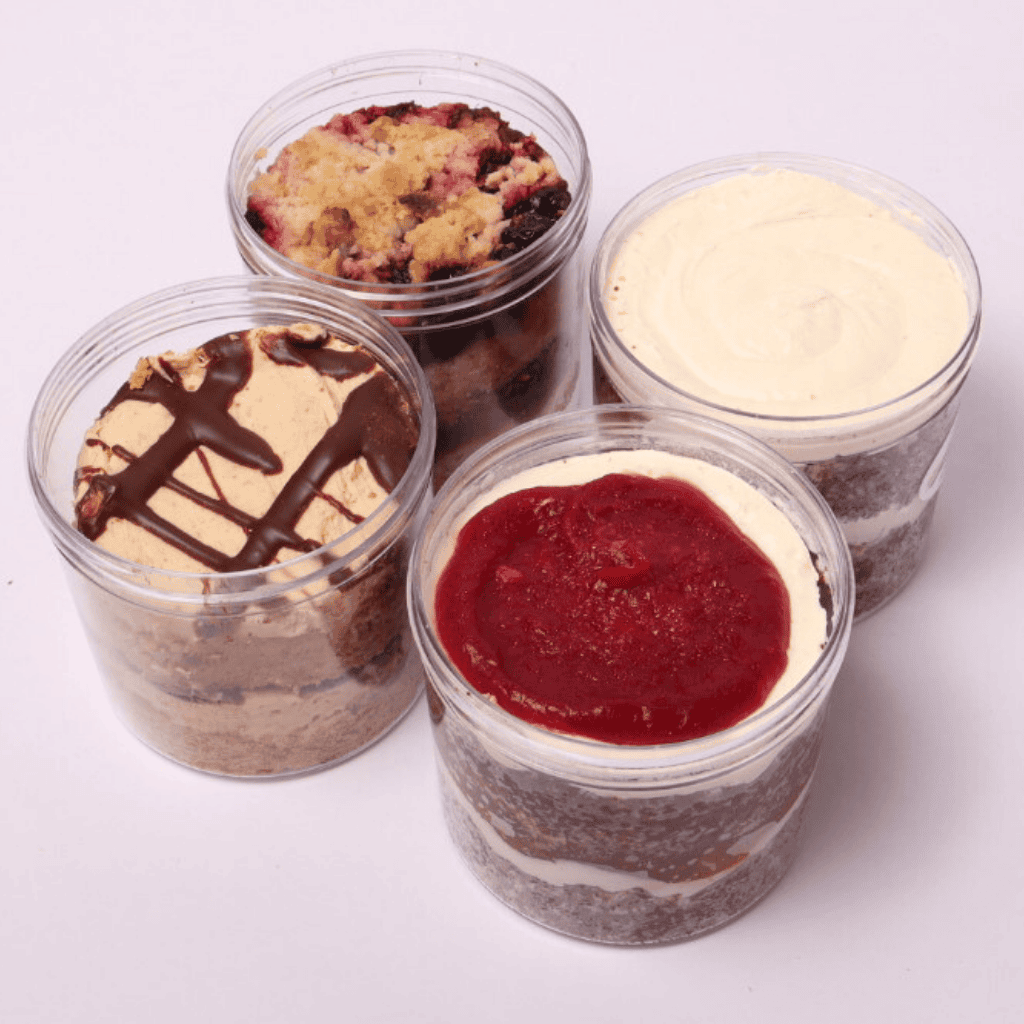 Artisan Cake Jars – Freshly Baked & Ready to Enjoy – A variety of decadent cake jars, made with high-quality ingredients and rich flavors, offering a convenient and indulgent single-serve dessert for any occasion.