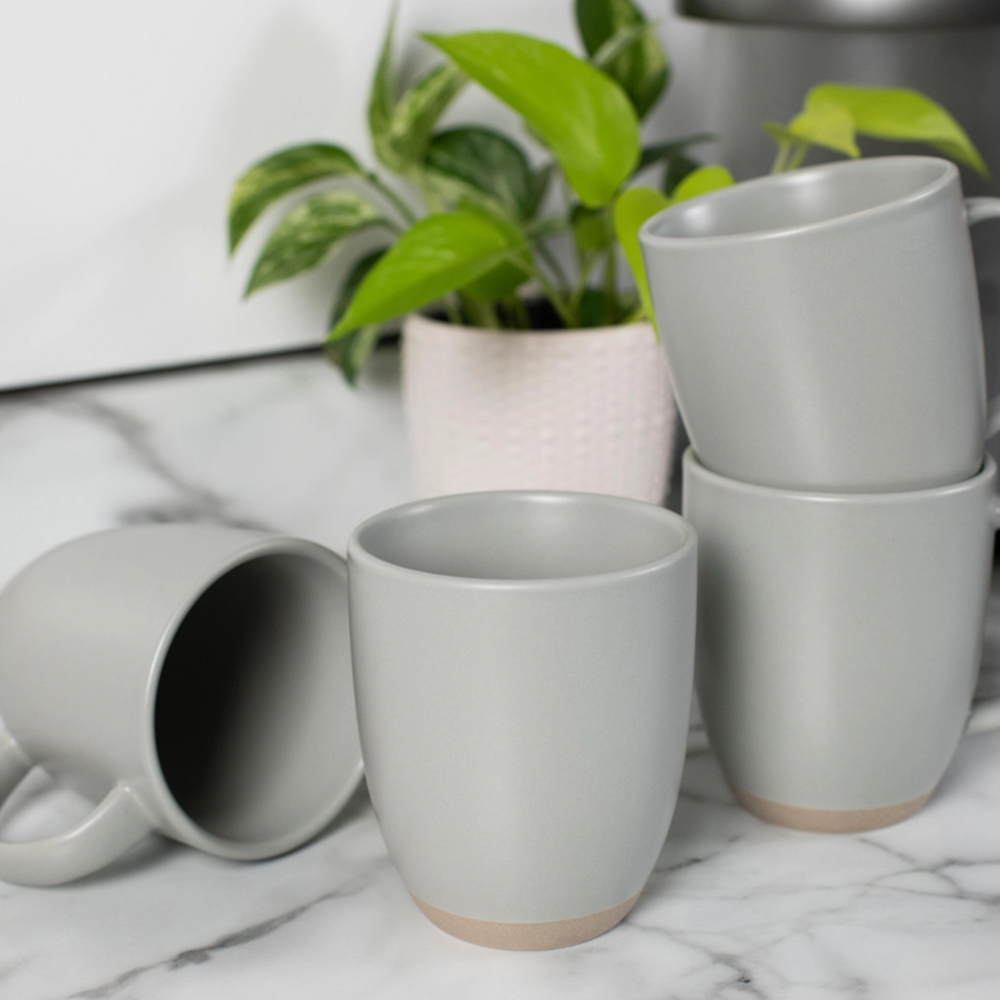 ceramic stone mug in light grey with a texture base.  perfect for a coffee and tea pacific northwest gift box
