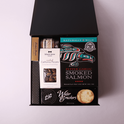 Charcuterie gift box made in WA, showcasing local Seattle flavors. Packed with meats, cheeses, and spreads, this is a perfect corporate gift or holiday gift basket for sharing and celebrating.