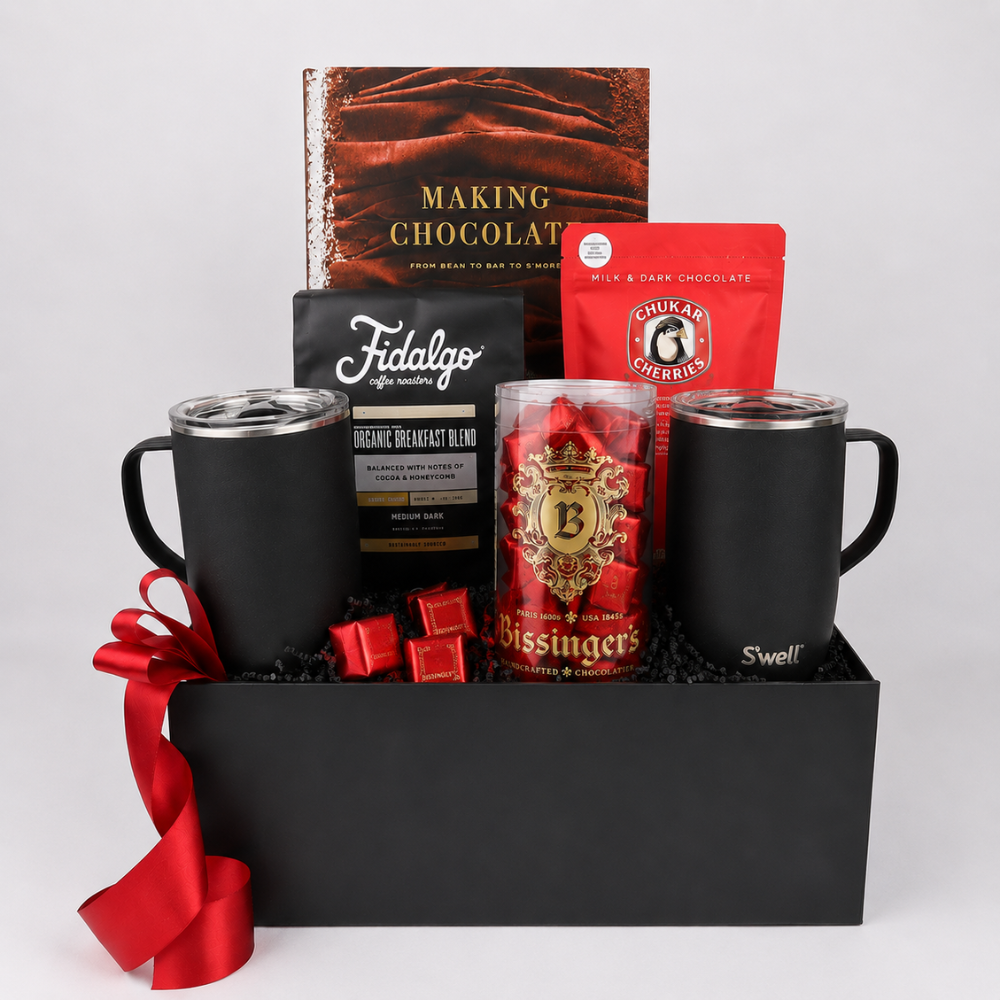 Luxury coffee and chocolate gift box with two black S’well mugs, Fidalgo coffee, Bissinger’s chocolates, Chukar Cherries and chocolate book.
