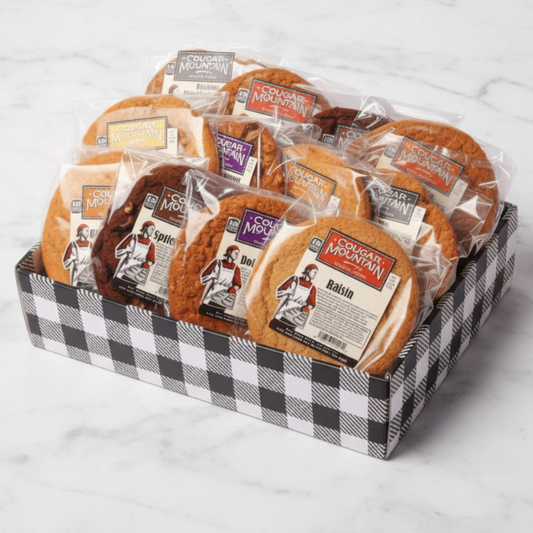 Fresh soft baked cougar mountain gift box with cookies come in chocolate chunk, snickerdoodle, oatmeal raisin, chocolate hazelnut, molasses and peanut butter.