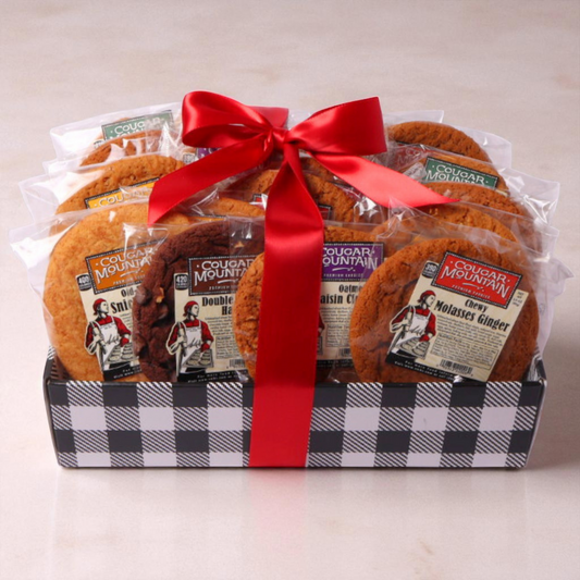 A delicious gift box of Cougar Mountain Cookies made in WA, perfect for a family or office to share. Includes flavors like Chocolate Chunk and Oatmeal Raisin. Ideal corporate gift, real estate closing gift, or team celebration. Delivery available