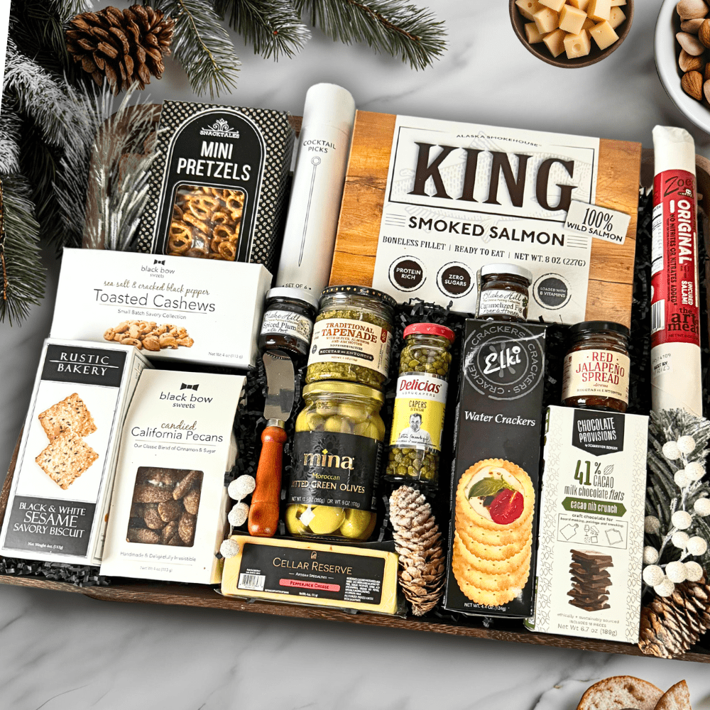 corporate holiday charcuterie git tray loaded with made in Washington goodies like: smoked salmon, crackers, nuts, cheese, olives and more