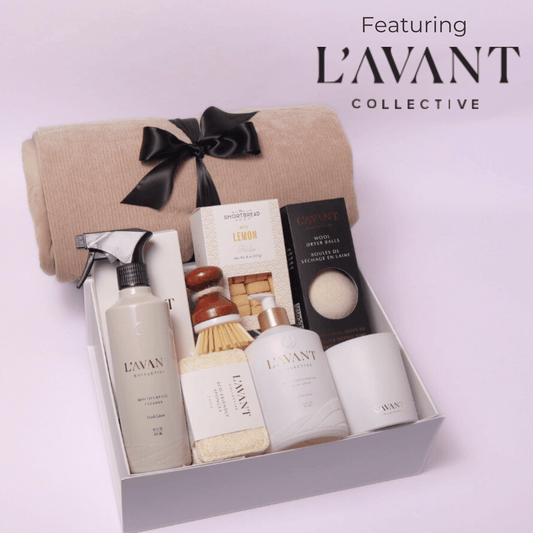 Luxury gift box featuring Seattle based Lavant collective luxury home products.  This luxury high end gift box includes: multipurpose cleaner, scrub brush, dish soap, candle, dryer balls, cookies and a luxe cream cozy throw.
