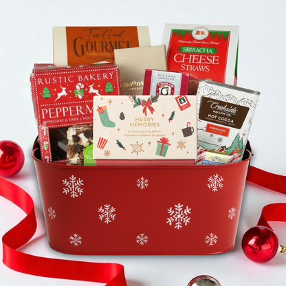 merry memories family gift basket with activity cards, holiday-themed snacks and a card on a white background