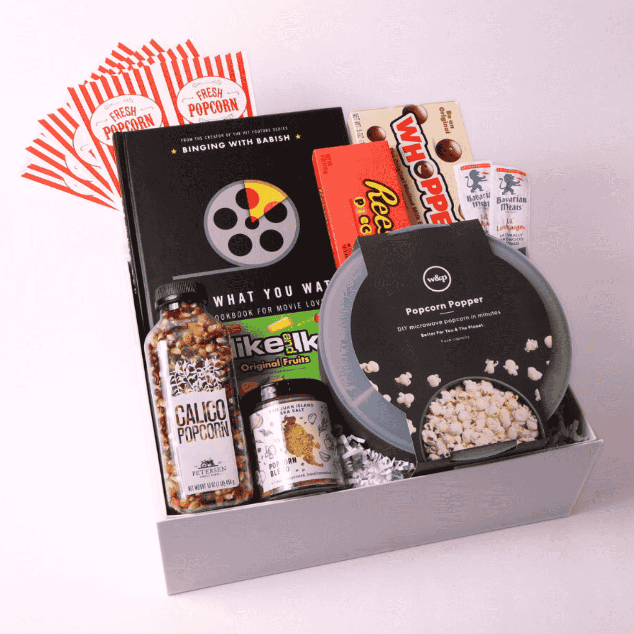 Seattle-inspired movie night gift box featuring gourmet popcorn, candy, and snacks, perfect for family nights or couples in the Pacific Northwest.