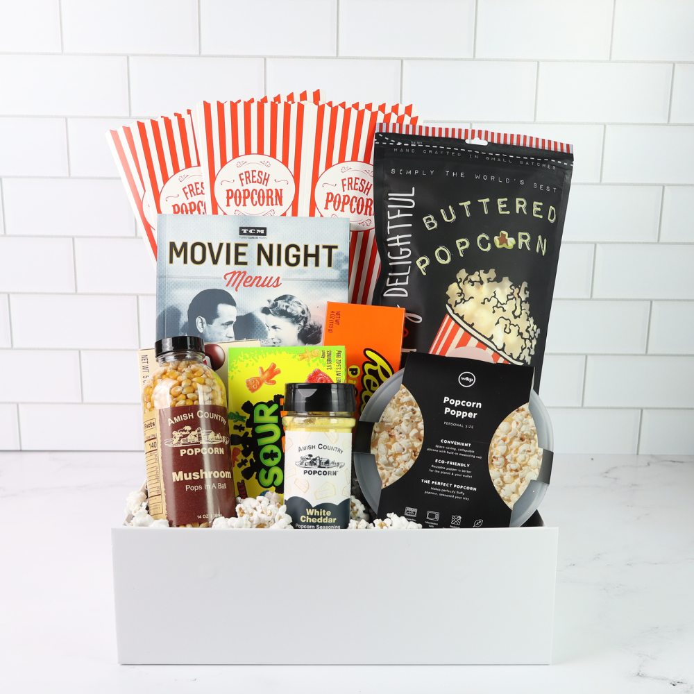 Seattle-inspired movie night gift box featuring gourmet popcorn, candy, and snacks, perfect for family nights or couples in the Pacific Northwest.
