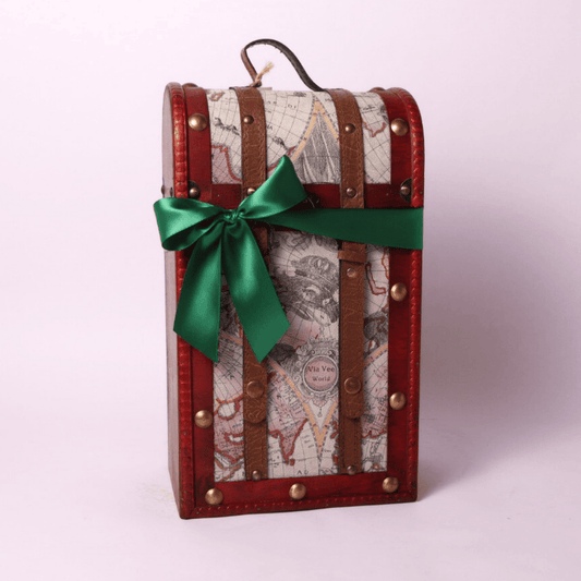 A beautifully curated retirement gift for women, featuring gourmet snacks in a stylish travel-themed chest. Ideal as a retirement gift for men or women who appreciate delicious treats.