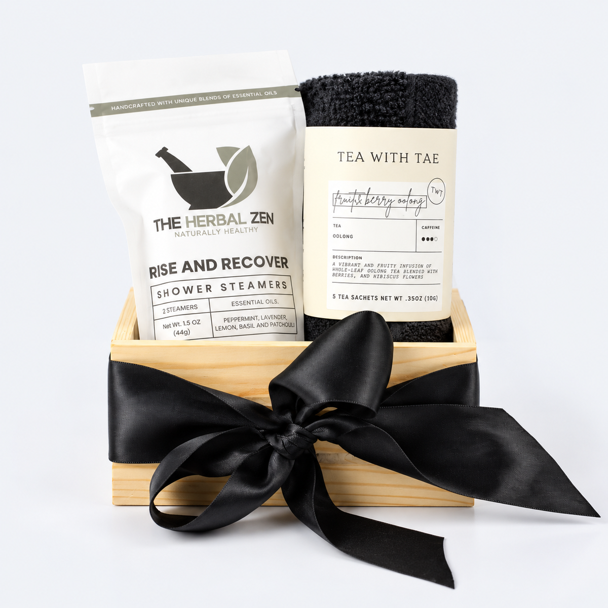 gift basket with shower steamers, tea and washcloth