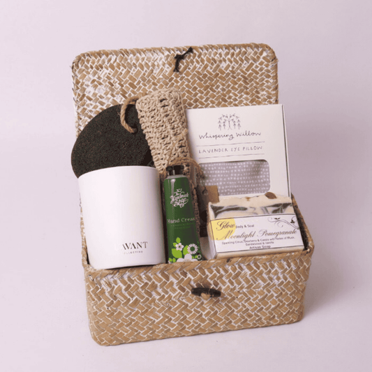 Spa Escape Gift Box – A beautifully curated self-care gift set featuring a lavender eye pillow, hand-poured candle, artisan soap, hand cream, and exfoliating accessories, perfect for a friendship gift, sympathy gift, or get well soon gift.