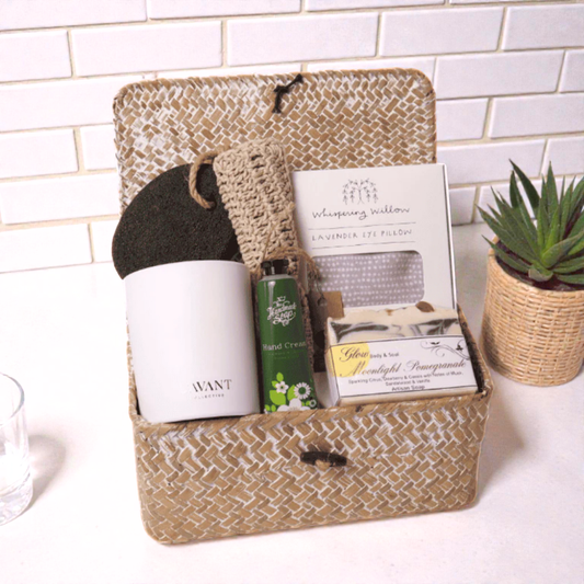Spa Escape Gift Box – A beautifully curated self-care gift set featuring a lavender eye pillow, Seattle made hand-poured candle, artisan soap, hand cream, and exfoliating accessories, perfect for a friendship gift, sympathy gift, or get well soon gift.