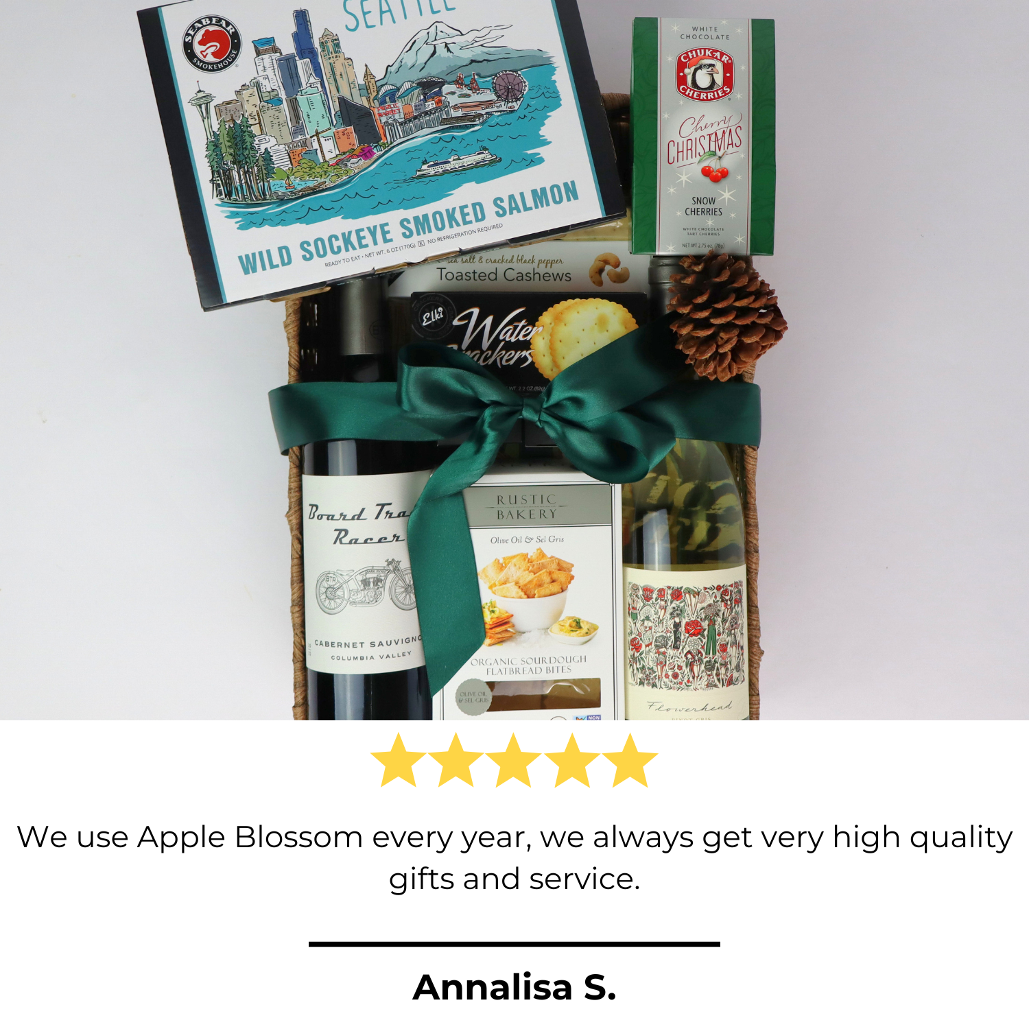 the best wine Gift basket with a bottle of wine, snacks, and a card on a white background. Five-star rating and review for corporate gifts.