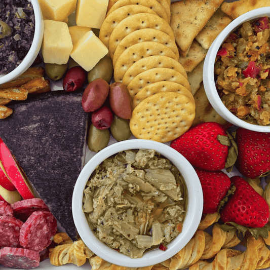 Close-up of artisan artichoke caper dip, a savory blend of tender artichokes and zesty capers, made in Maple Valley, WA.