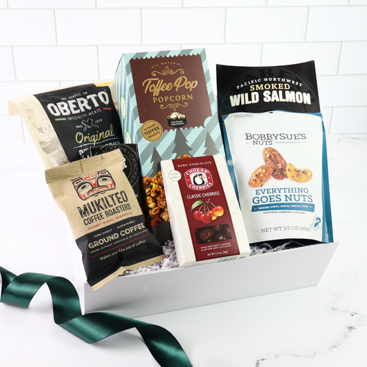 Washington snack box featuring smoked salmon, artisan chocolate, crackers, and locally inspired gourmet snacks in a white gift box