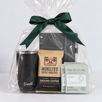 Workday Essentials coffee and tea gift set wrapped in clear cellophane with an emerald green satin bow, ready for corporate gifting or employee appreciation.